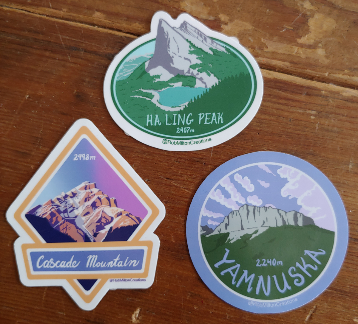 Stickers of mountain art including Haling Peak, Cascade Mountain and Yamnuska